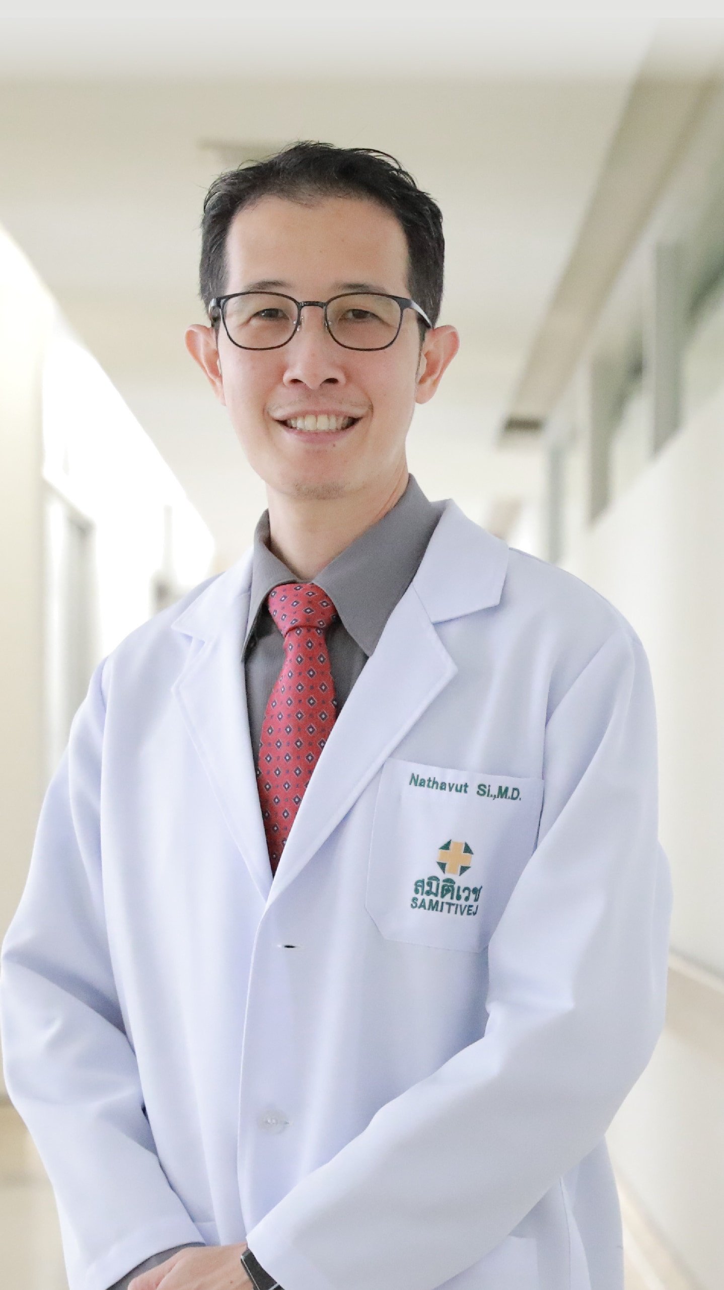 Dr. Dr. Nathavut Sirimontaporn, M.D.