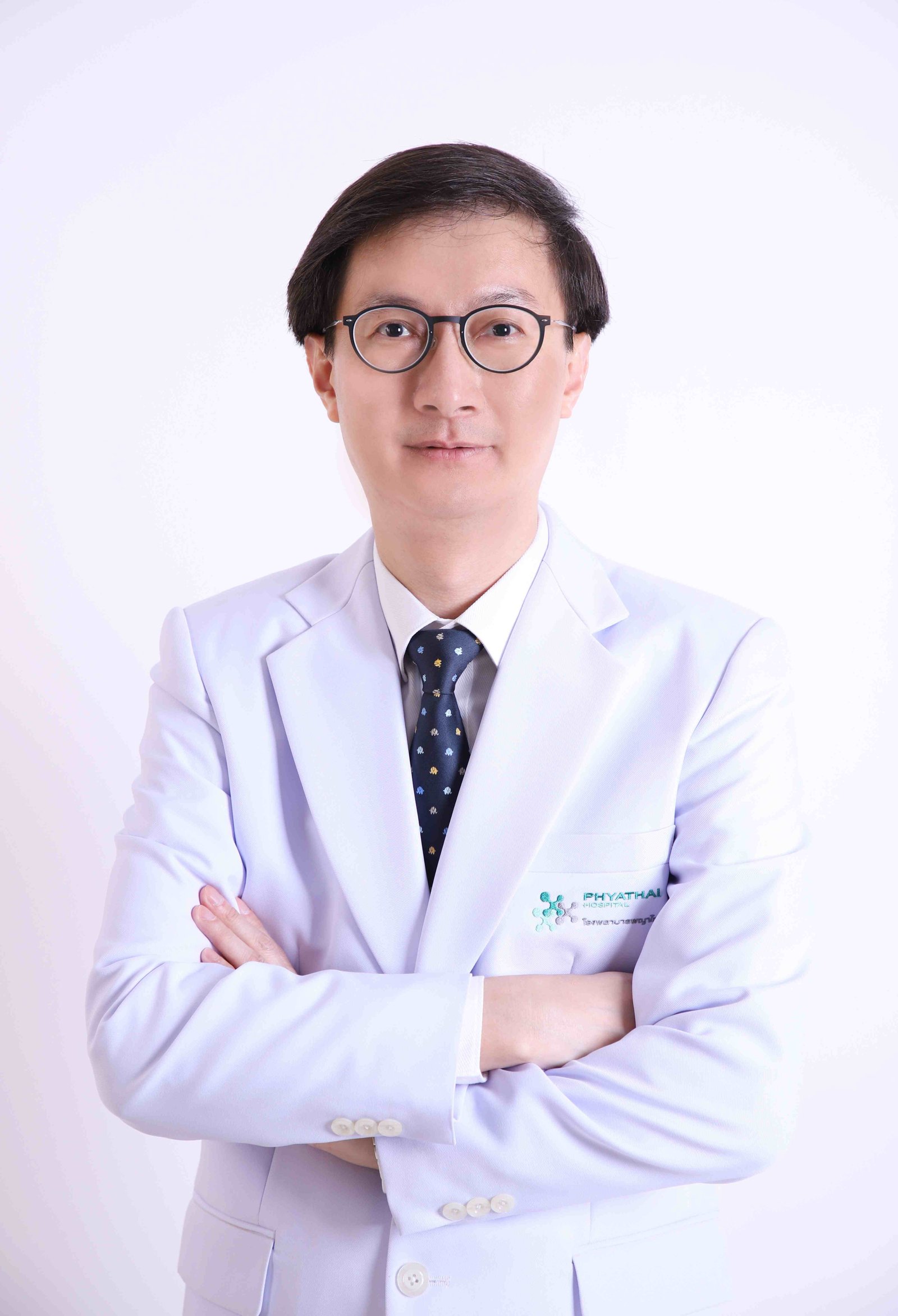 Dr. Thongchai Paisansinsup